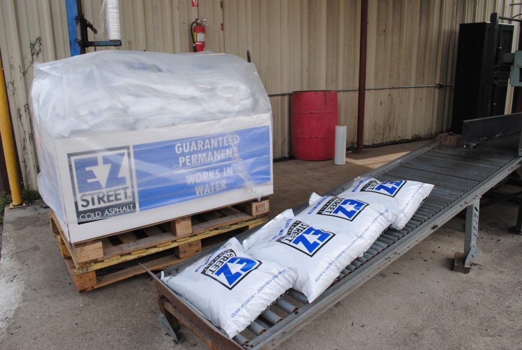 Newly bagged packages of EZ Street asphalt are prepared for delivery.